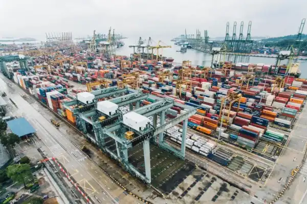 Aerial view of commercial fleet vehicles in a container yard
